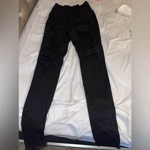 Distressed denim jeans